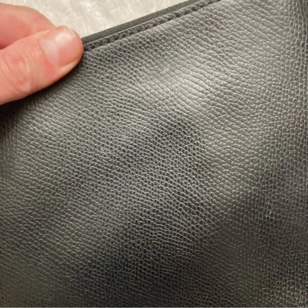 Coach black grained leather file crossbody bag